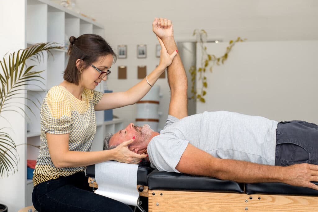 A chiropractor performing holistic chiropractic adjustments